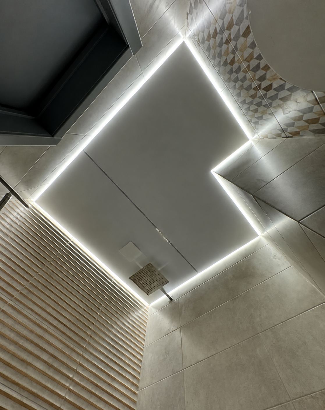 Bathroom · A floating panel framing the shower head