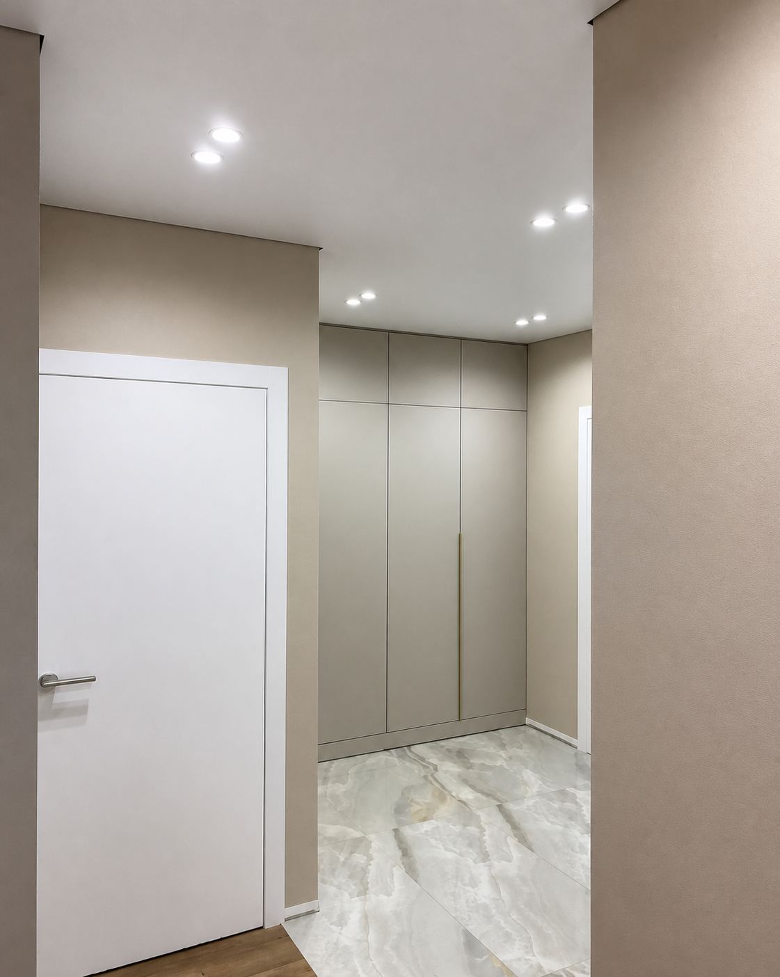 The shadow line continuing down a narrow hallway