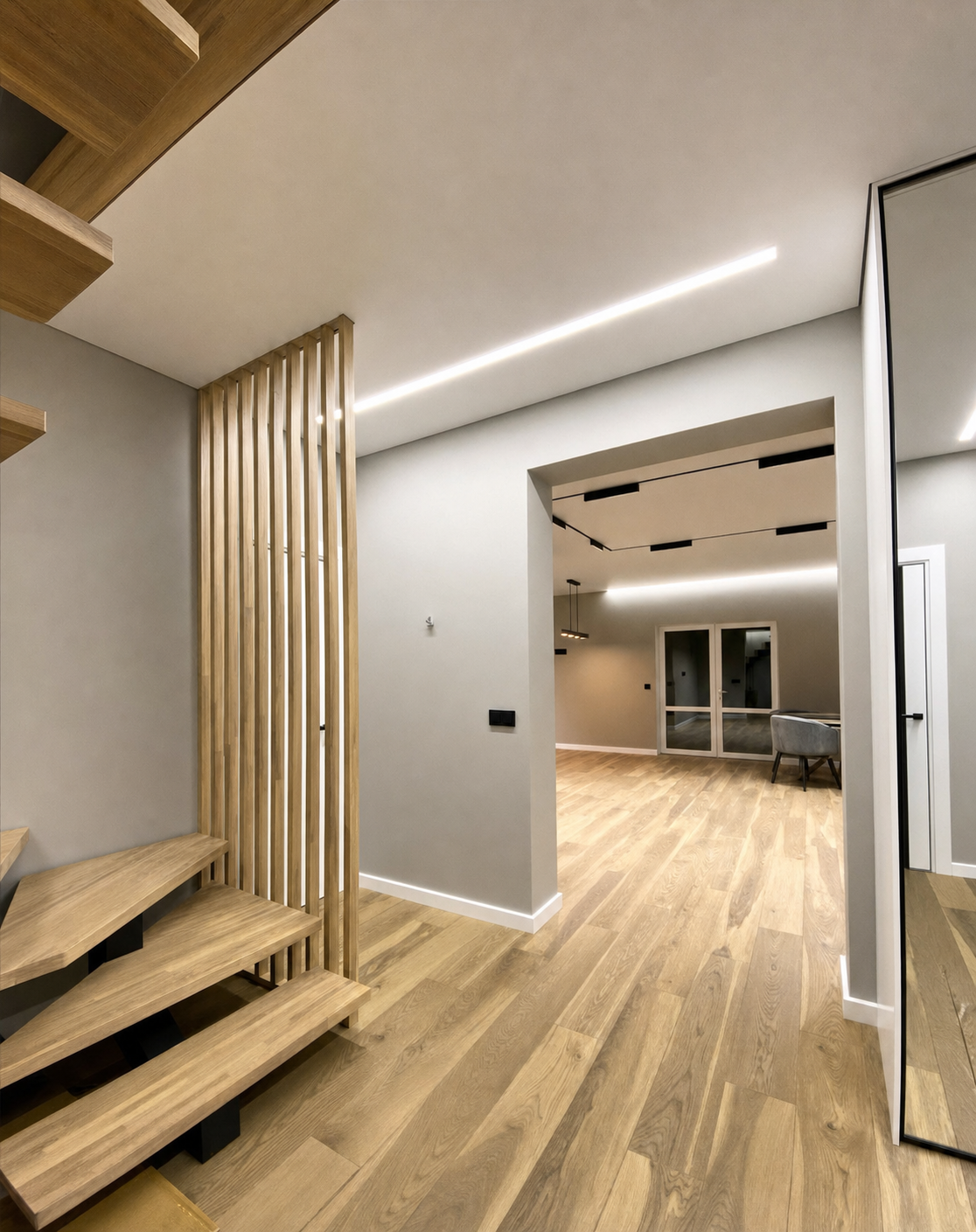 A staircase landing opening into the open-plan living and dining area